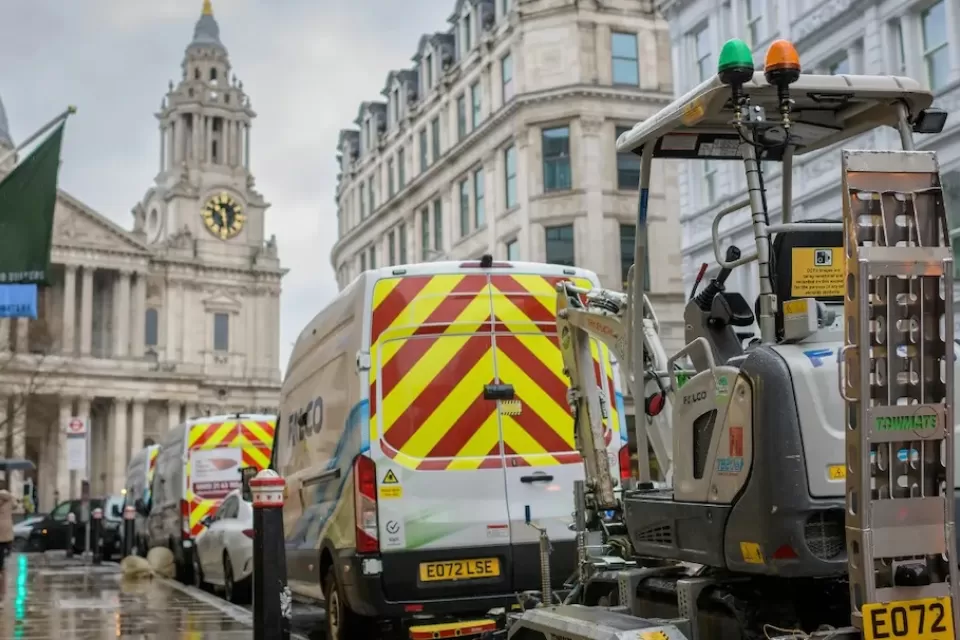 Electric road digger on street construction site in London, UK.